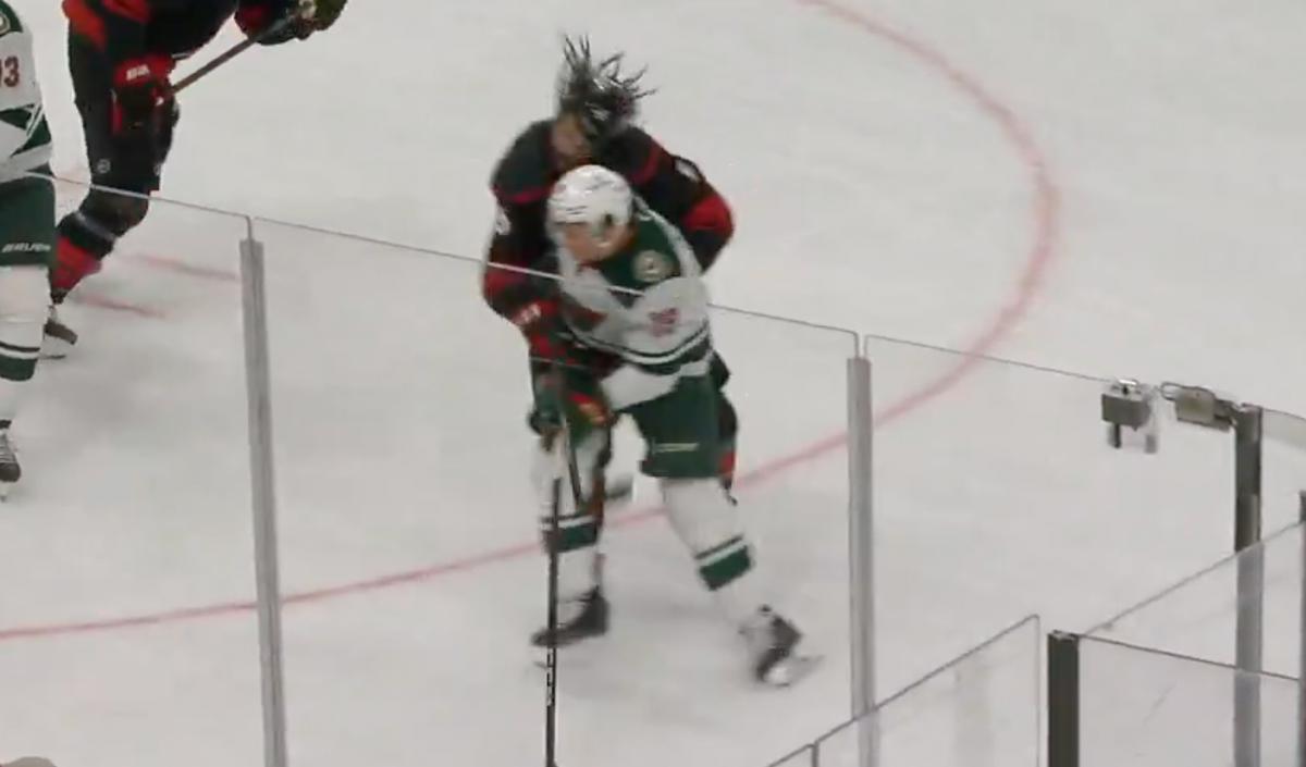 Tyler Pitlick's hit on Jalen Chatfield 