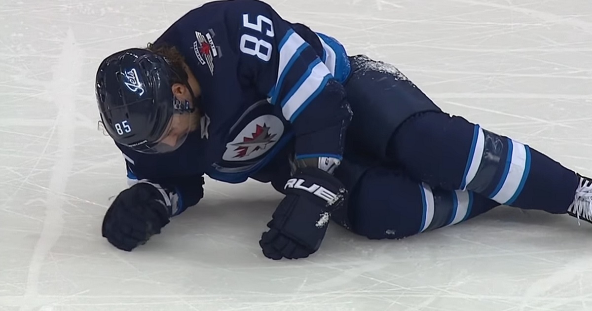 Mathieu Perreault gets crushed by a massive open ice hit from Dale Weise.