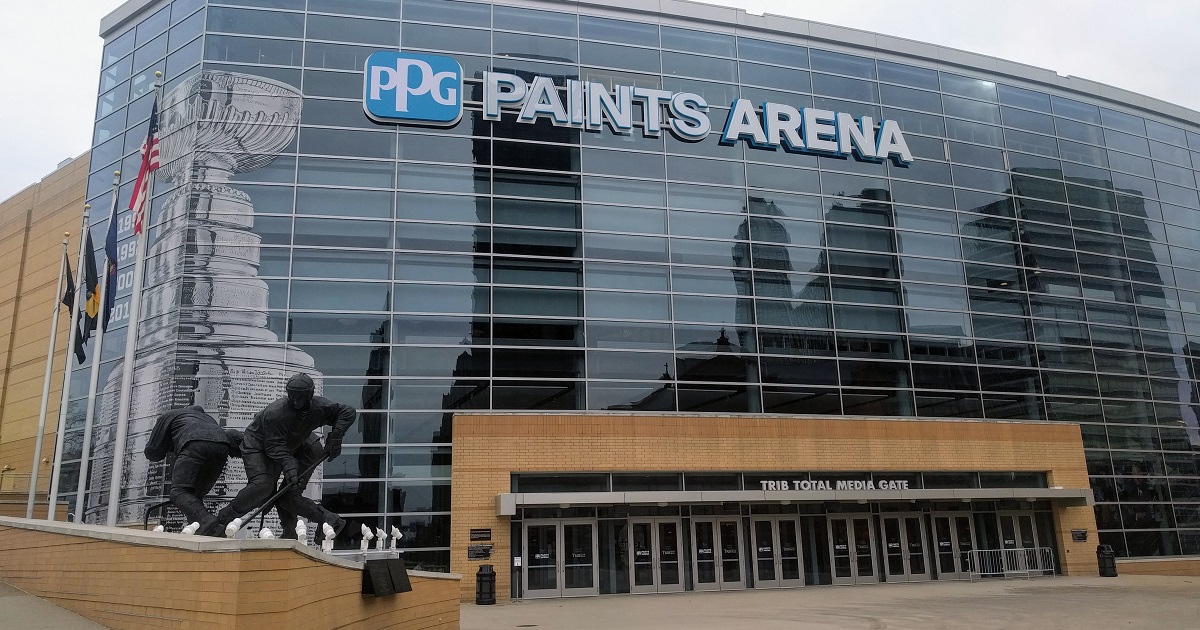 Penguins President David Morehouse saves man from violent mob outside PPG Paints Arena.