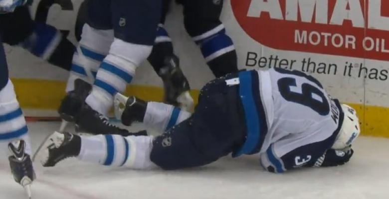 (VIDEO): Enstrom is left a bloody mess after hit from behind.