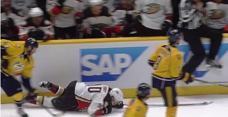 Perry gets dropped by a nasty spear from Ribeiro.