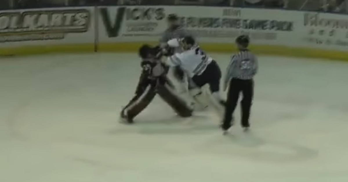 Two goalies throw down after a stoppage in play.