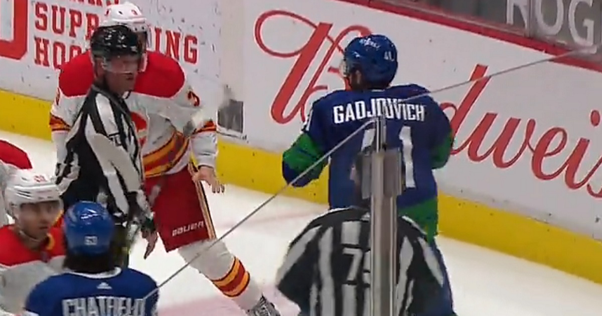 Canucks rookie Jonah Gadjovich drops the gloves in his first career NHL game.