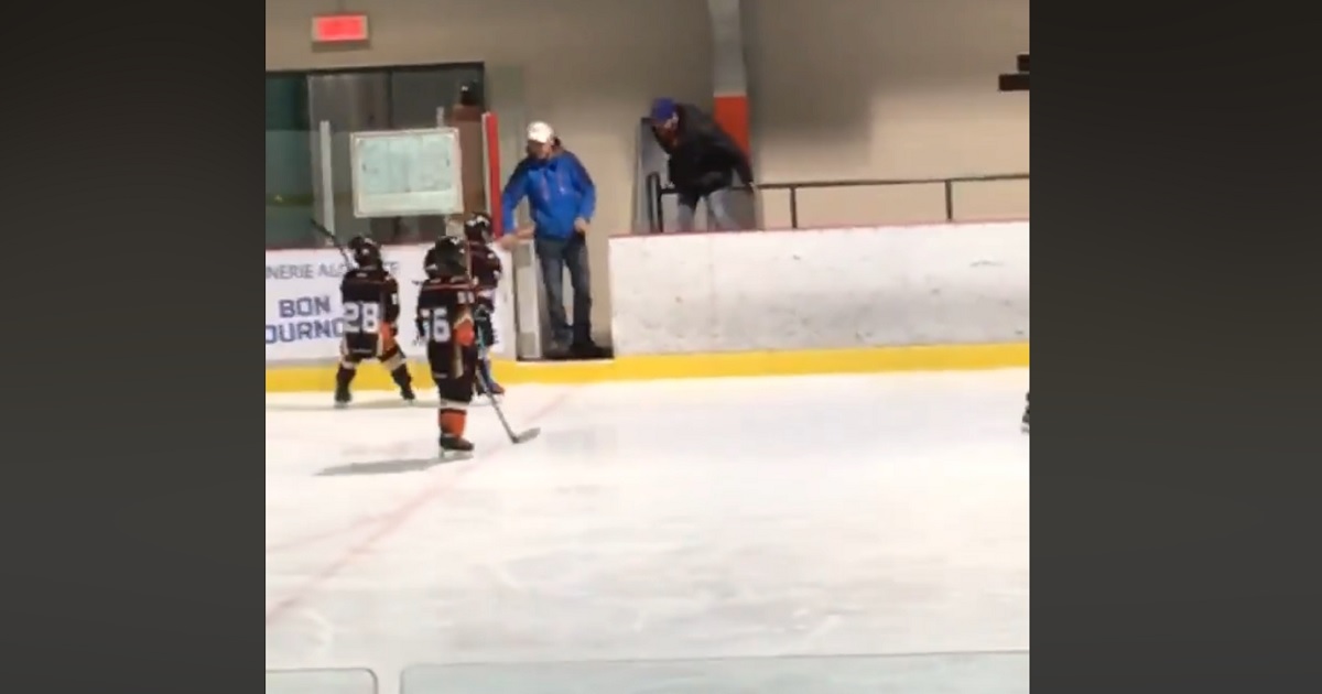 Awful video catches coach berating a young child during hockey game.