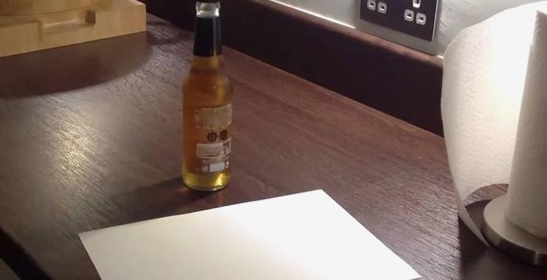 Lifehack: How to open a beer in an emergency using only paper.