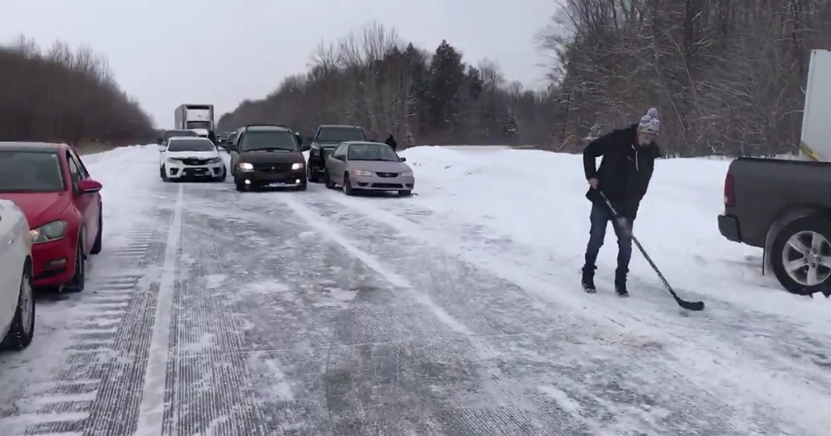 Hockey fans react to major 75 car accident in the most Canadian way ever!