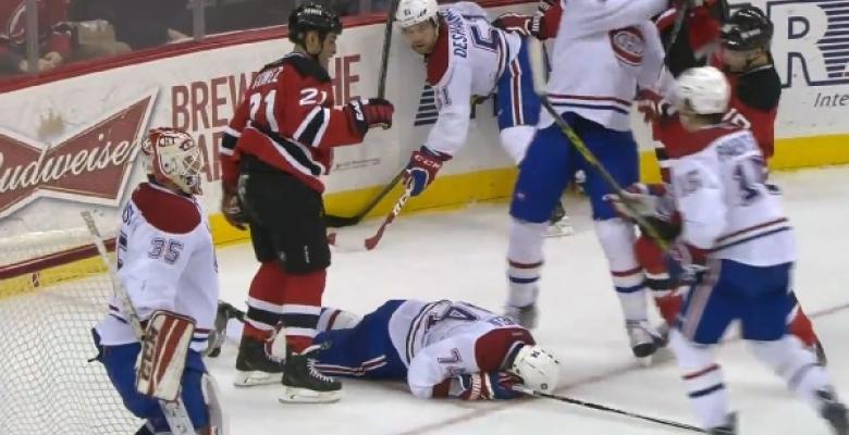 Scott Gomez takes out former teammate with a vicious elbow.