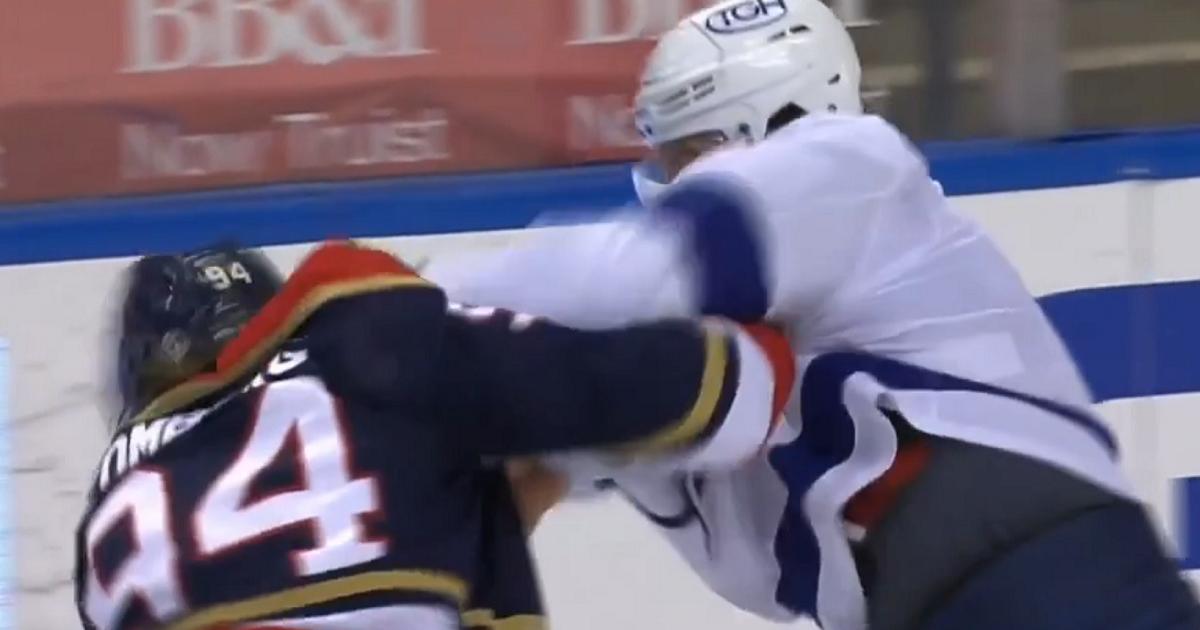 Luke Schenn pummels Ryan Lomberg seconds after he steps out on the ice.