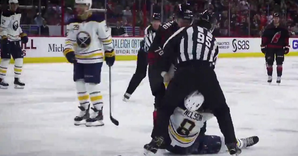 Nelson gets dropped with one punch and then gets tea bagged by the ref!