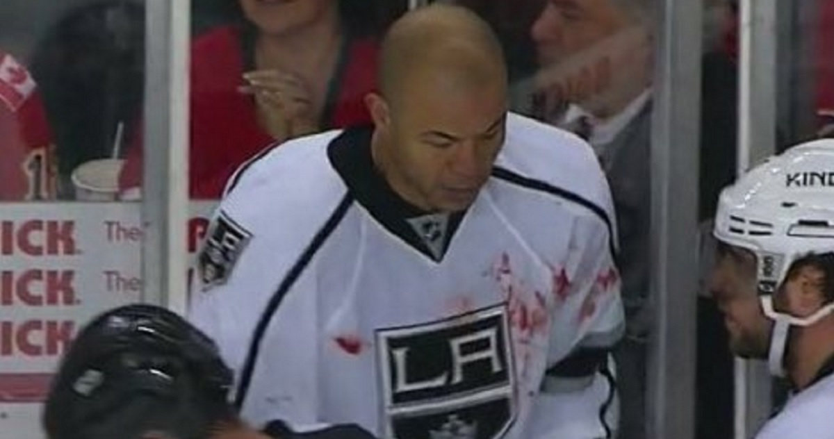 Iginla wearing Engelland's blood on his jersey after great fight between two vets.