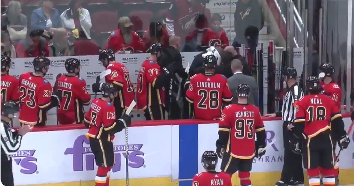 Breaking: NHL head coach leaves the game after taking a puck to the face.