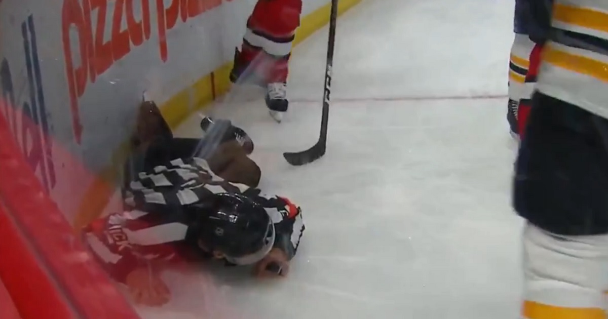 Brad Marchand takes out an NHL official after a big hit.