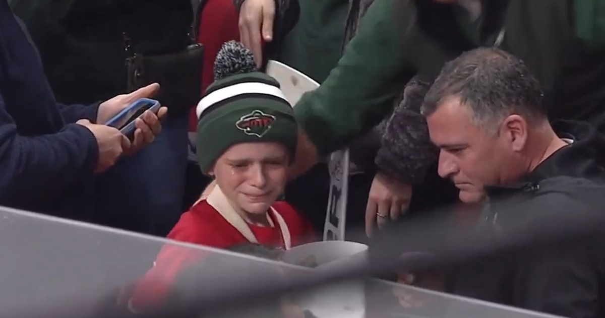 Devan Dubnyk brings a young fan and his father to tears.