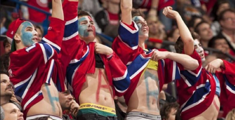 (VIDEO): Crazy Habs fan runs onto the ice, tries to get in the dressing room.