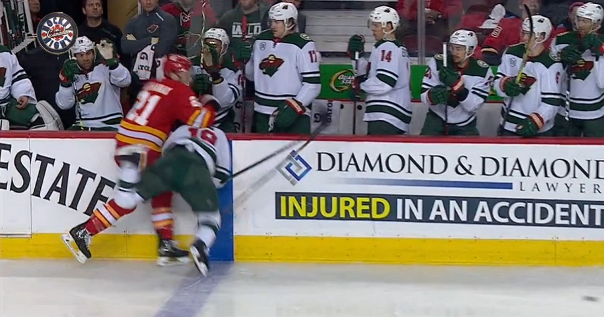 Hathaway slams Kunin's head right into the edge of the boards.