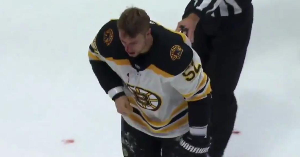 Sean Kuraly gets rocked by a massive uppercut from Ben Harpur.