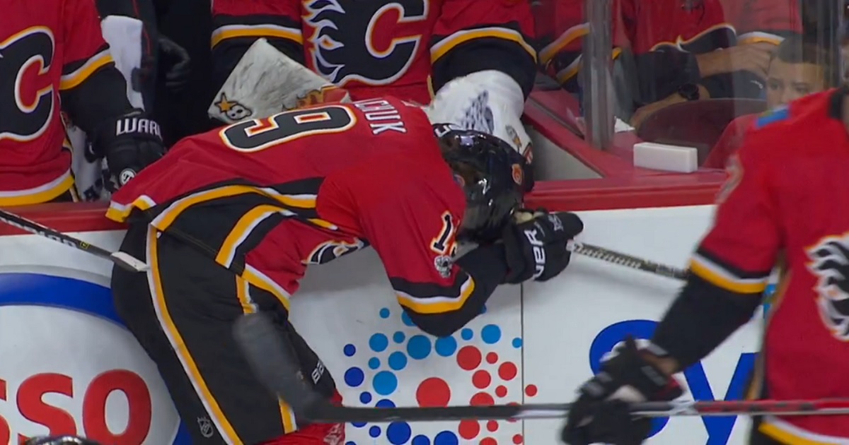  Flames star Matthew Tkachuk injured after being crushed in front of his own bench.