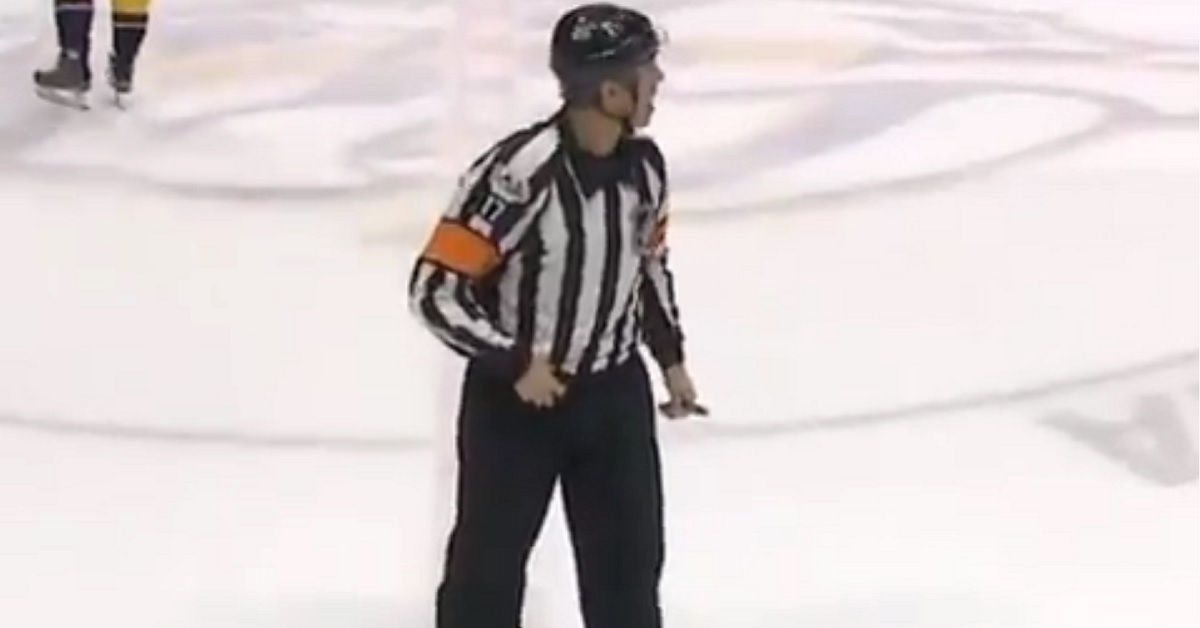 NHL official caught cursing at player on live mic.