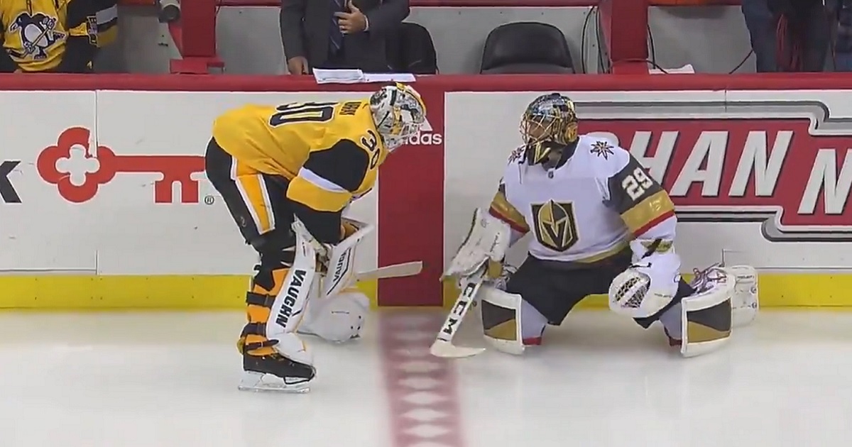 Marc Andre Fleury shares a special moment before the game with several former teammates.