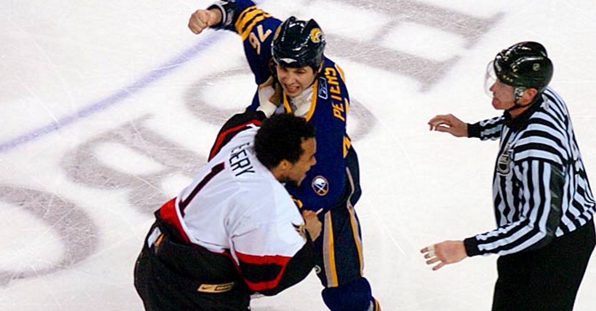 10 years ago today Ray Emery fights a goalie and an enforcer in an epic hockey brawl!