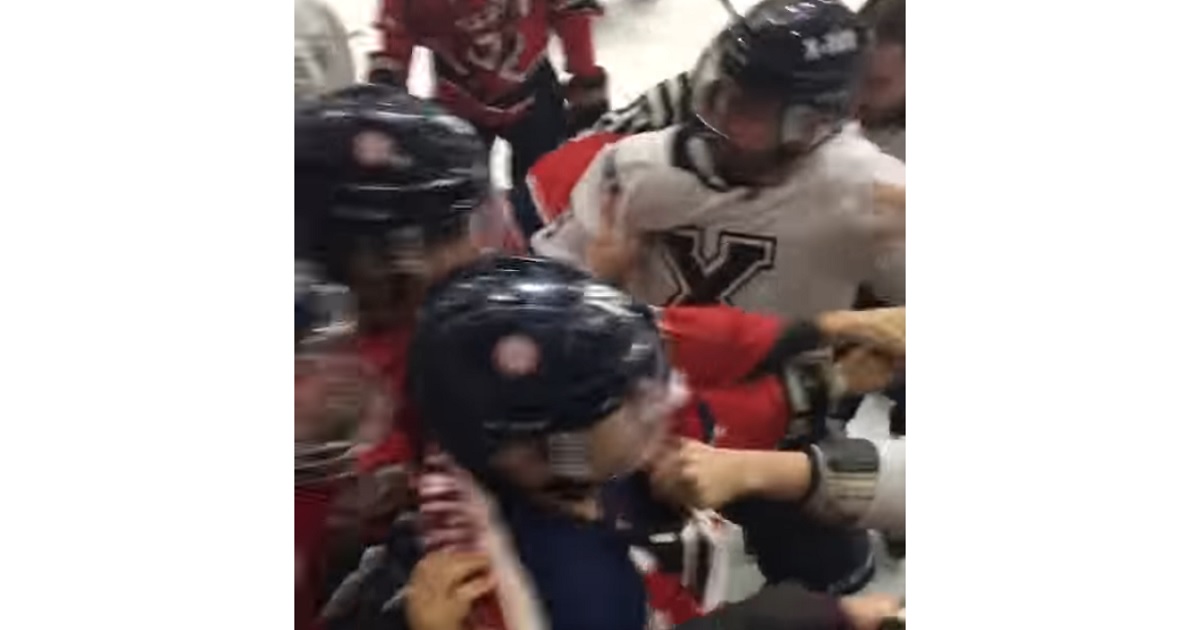 Canadian University hockey game erupts into wild bench brawl!
