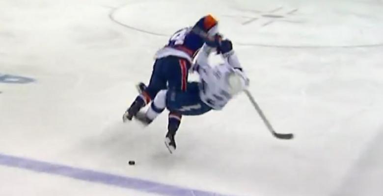 Joanthan Drouin gets flattened by a HUGE open ice hit!