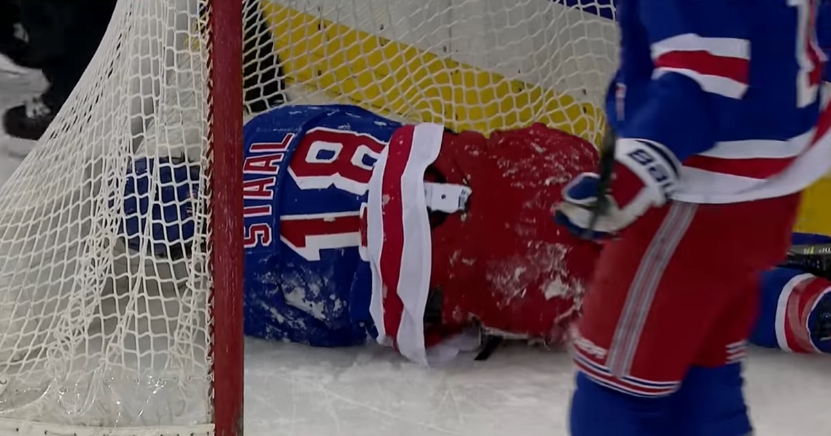Staal crashes into his own net, scores an own goal at the same time.