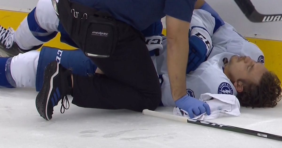 Yanni Gourde laid out after a brutal hit from Nick Ritchie.
