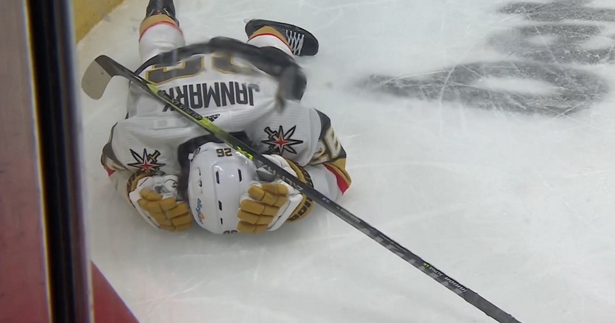 Mattias Janmark gets crushed by Ryan Graves in Game 1.