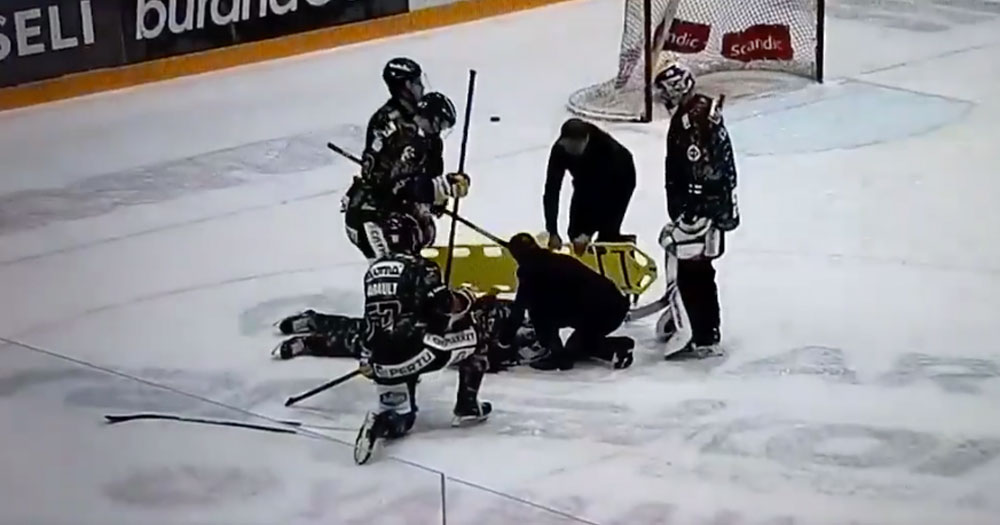 Canes top prospect Patrik Puistola stretchered off the ice after nasty hit! 