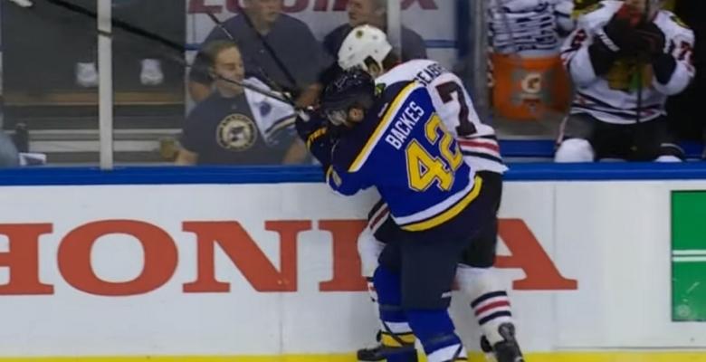Hit from Backes breaks the glass just 26 seconds into the game.