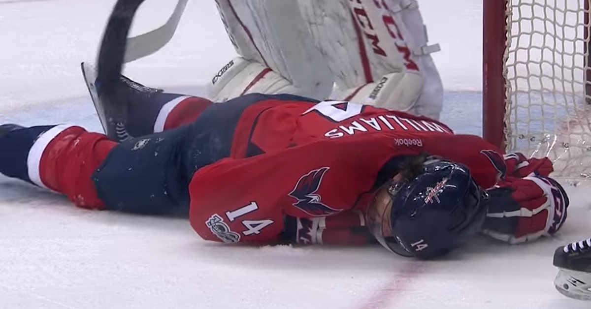 OUCH! Williams goes down after eating a one-timer in the head.