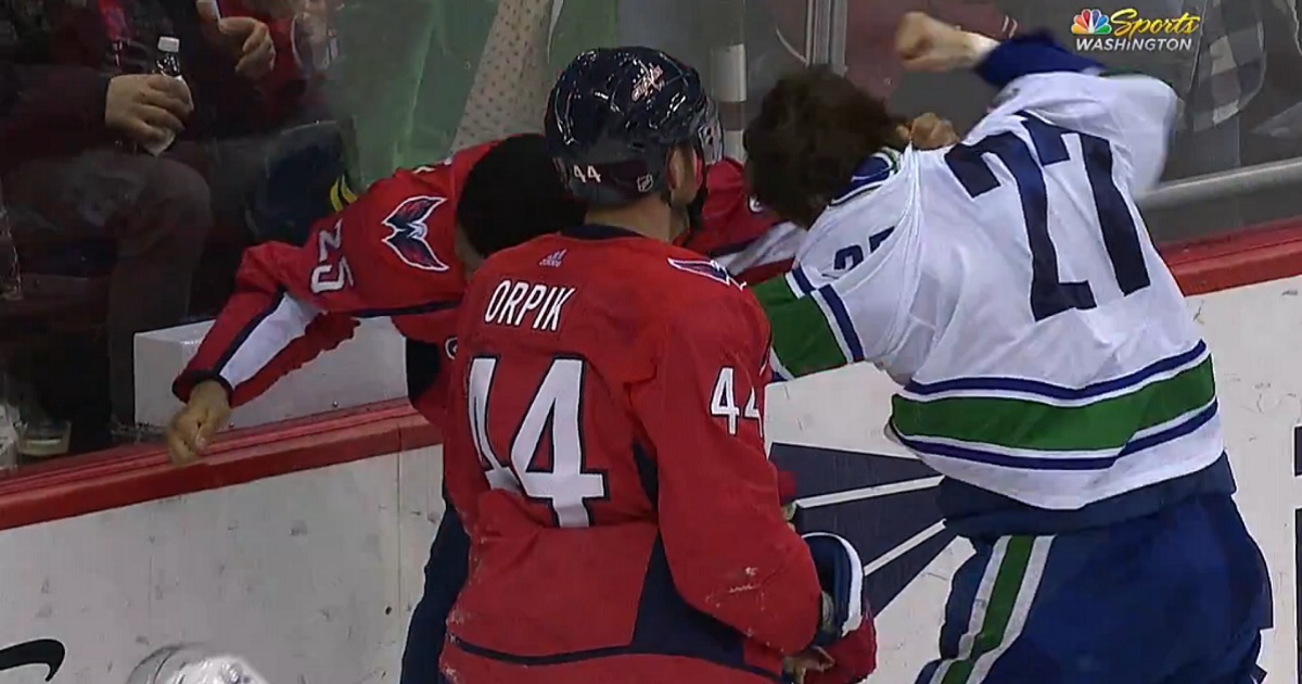 Hutton crushes Orpik then drops the gloves for a solid scrap. 