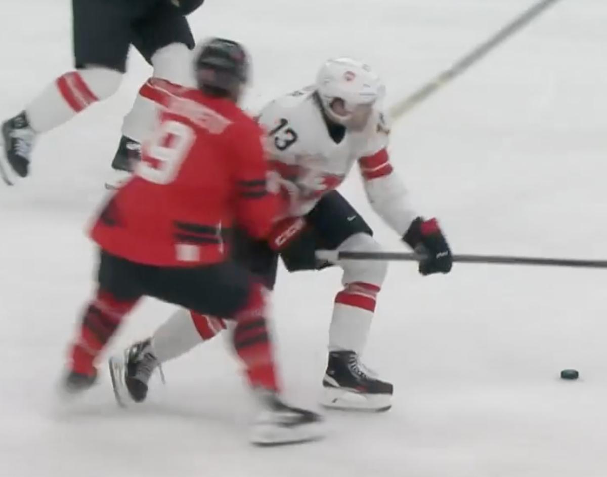 Sam Bennett clips Nico Hischier. 